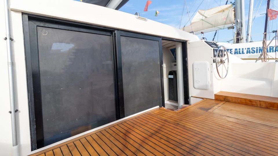 From Stintino: Catamaran Tour to Asinara Island - Onboard Amenities and Refreshments