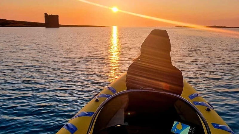From Stintino: two-hour dinghy tour at sunrise or sunset - The Sum Up
