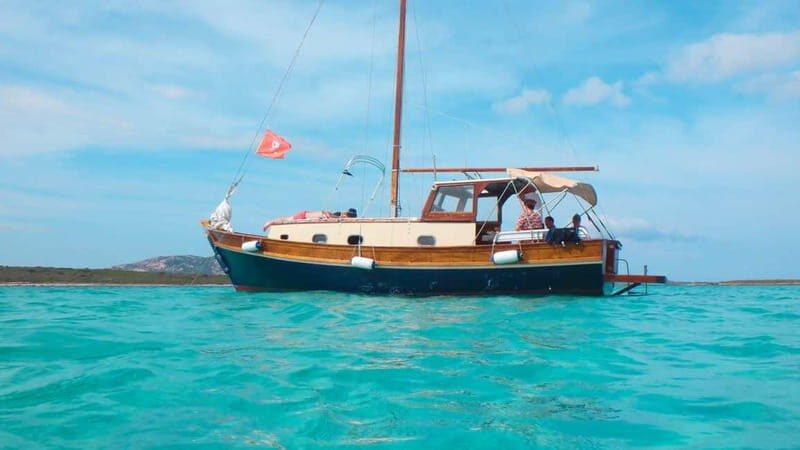From Stintino: wooden boat excursion to Asinara Island - Snorkeling and Swimming: Refreshing Breaks