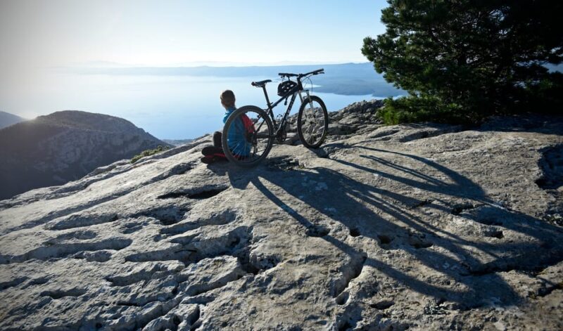 From Supetar & Postira: Vidova Gora to Dol Biking Tour - Museum of Oil