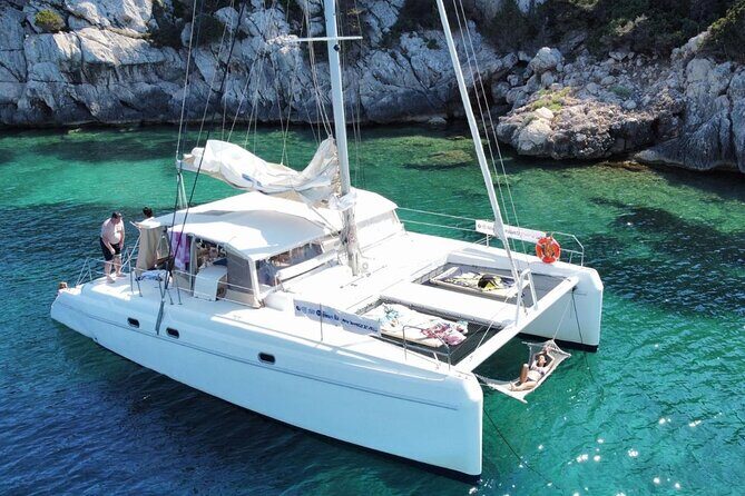 Full day Catamaran cruise in Porto Conte Natural Park - Discover Sardinia’s Coast on a Full-Day Catamaran Cruise in Porto Conte Natural Park