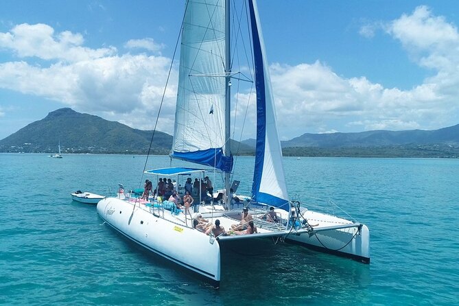 Full Day Catamaran Cruise on Shared Basis to Bénitiers Island - Pricing and Booking Details