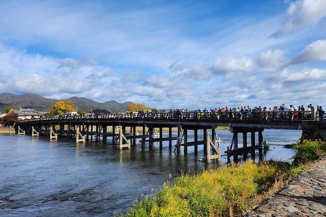 Full Day Guided Tour to Kyoto Arashiyama From Osaka by Van - Meeting and Pickup