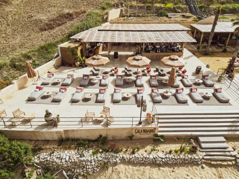 Full Day Pass to Cala Manbrù Beach Club - Key Points