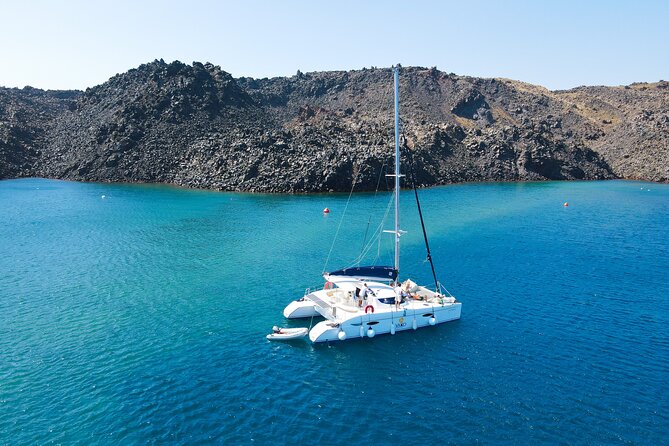 Full Day Santorini Catamaran Private Cruise With Meal and Transfer - Beverages and Spirits Included