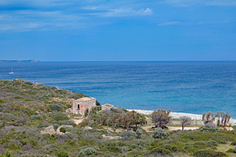 Full-Day Villasimius and Capo Carbonara Boat Tour With Lunch - Marine Protected Area Exploration
