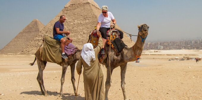 Giza: Pyramids at Sunset Guided Camel Tour - Booking and Cancellation Policies