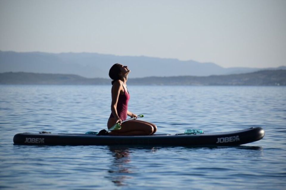 Golfo Aranci: Dolphin Watching SUP Paddleboard Tour - Eco-Friendly Adventure