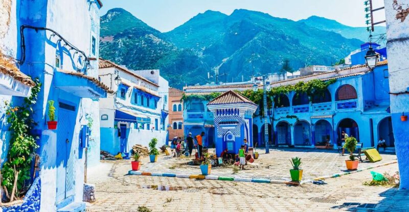 Group Day Trip From Fes to Chefchaouen With Local Guide - Transportation and Itinerary