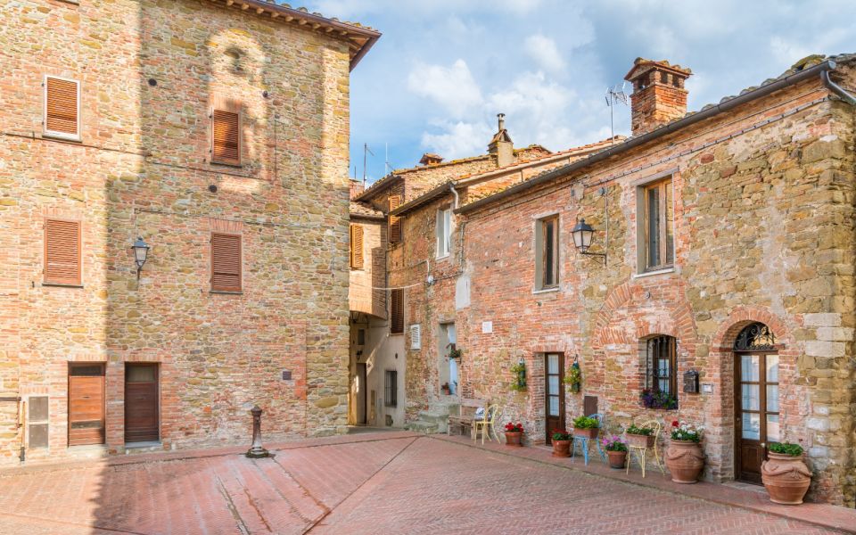 Gubbio: Private Walking Tour and Food Tasting - Exploring Roman Amphitheater Ruins