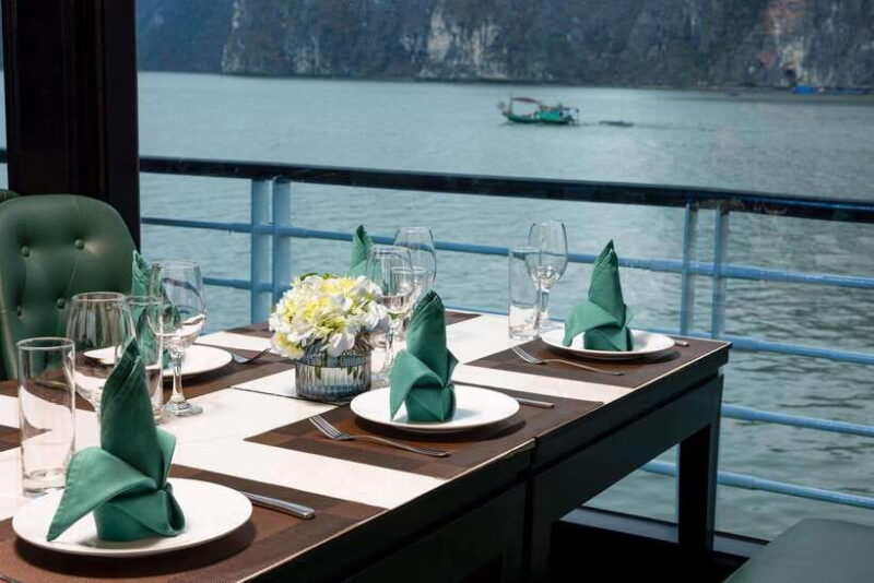 Ha Long Bay: Luxury Day Cruise, Caves, Kayak & Buffet Lunch - Relaxing at Titop Island