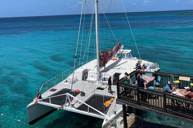 Half Day Catamaran Party Boat, Snorkeling and Hip Strip Tour - Key Points