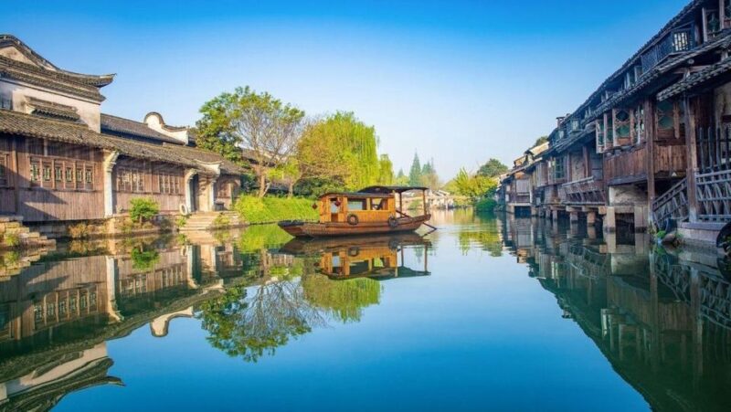 Hangzhou: Private Day Tour to Wuzhen Water Town - Itinerary Highlights