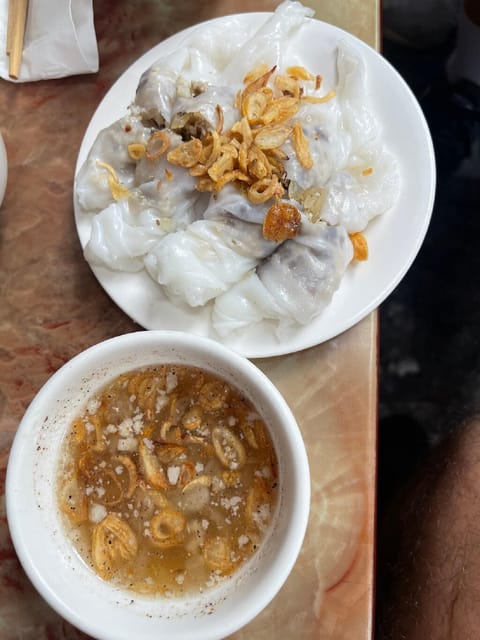 Hanoi: 3 Hours of the Street Food Tour With Local Delicacies - Taking in the Vibrant Street Scenes