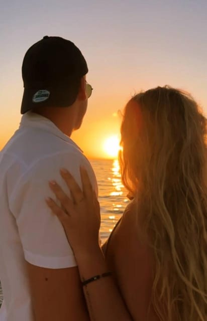 Hersonissos: Sunset Catamaran Cruise with Snacks and Drinks - Water Activities and Onboard Comfort