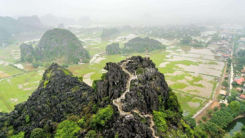 Hoa Lu – Tam Coc – Mua Cave: Full-Day Adventure Tour - Bamboo Boat Ride in Tam Coc