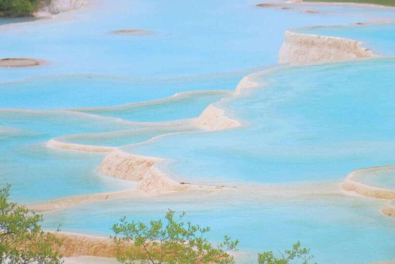 Huanglong Scenic Area: Explore Stunning Five-Colored Ponds - The Value of Huanglong’s Natural and Cultural Wealth
