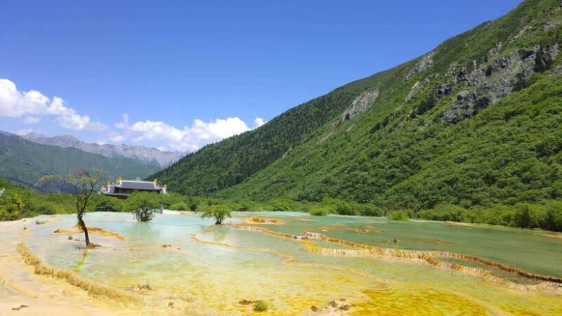 Huanglong Scenic Area: Explore Stunning Five-Colored Ponds - How Does It Compare to Other Tours?