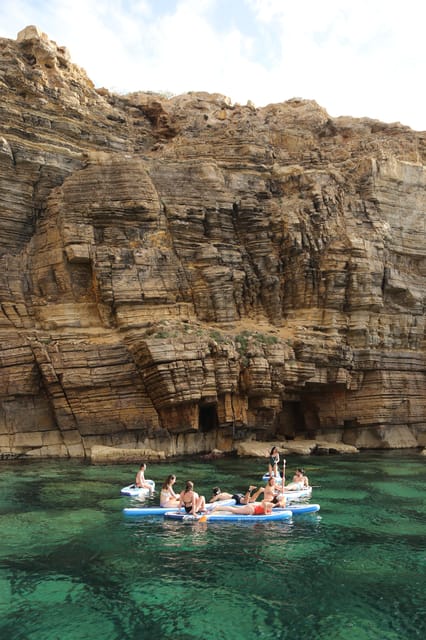 Ibiza: Scenic Sunset Cruise With Tapas and Drinks - Paddle Surfing and Snorkeling Opportunities