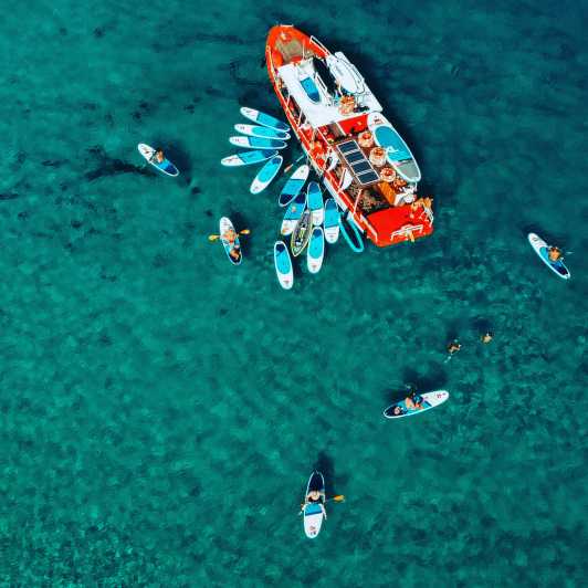 Ibiza: Secret Coves Guided Boat Tour With Open Bar and Tapas - Exploring the Stunning Coves