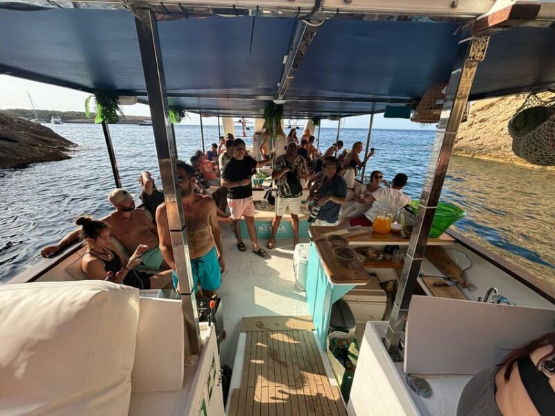 Ibiza: Sunset Boat Tour With Water Sports, Open Bar & Tapas - Meeting Point and Age Requirement
