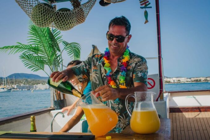 Ibiza: Sunset Boat Tour With Water Sports, Open Bar & Tapas - Scenic Cruising and Water Activities