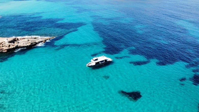 Ibiza: Sunset VIP Paella Cruise with drinks,Paddle Boarding - Introducing Ibiza’s Sunset VIP Paella Cruise: A Genuine Water Adventure
