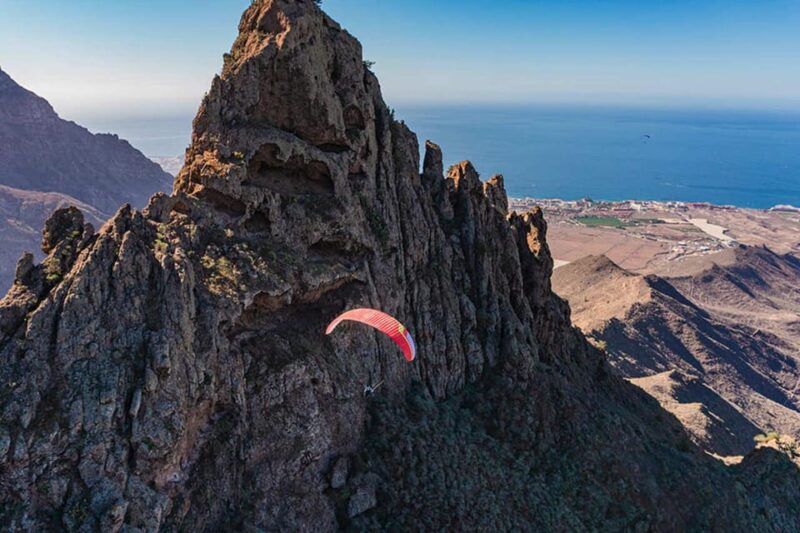 Ifonche: Paragliding Mid-Mountain Flight (1000M) - Gliding Over Rocky Needles