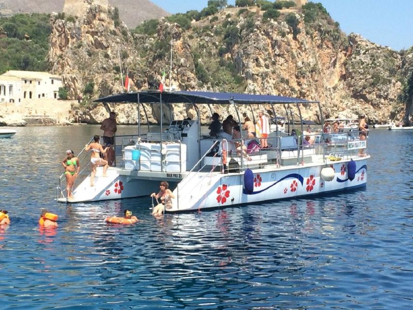 In Catamaran to Reserve Zingaro and Faraglioni Scopello - Pricing Details and Booking