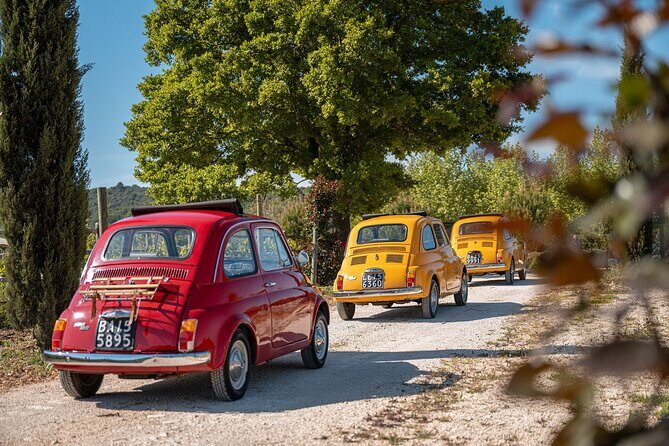 In Valle d'Itria on a vintage Fiat 500. Photo Quest Tour - FAQ  