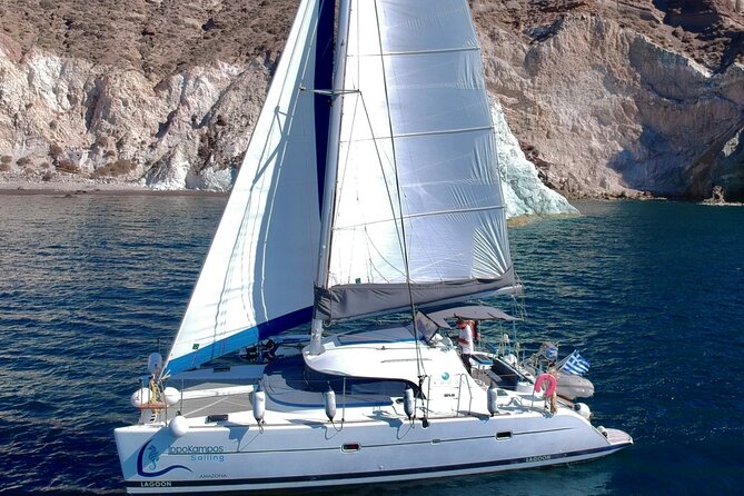 Infinity Blue Semi Private Sunset Cruise With Meal in Santorini - Itinerary and Stops