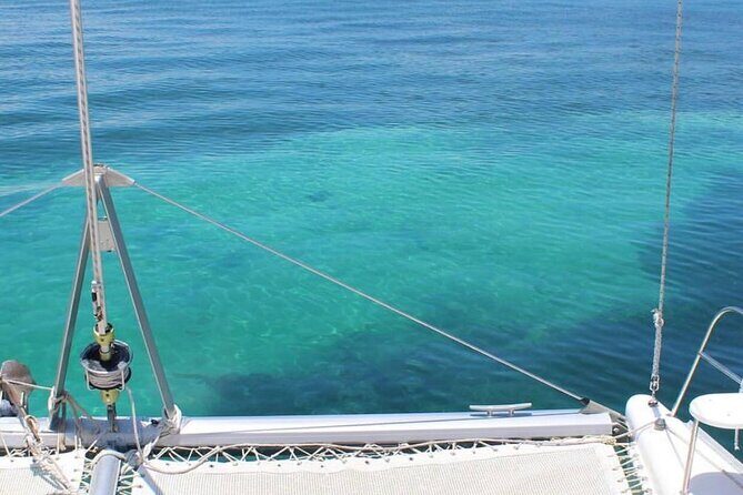 Isla Mujeres Catamaran Adventure Snorkeling Spinnaker and Lunch - Free Time and Beachside Relaxation
