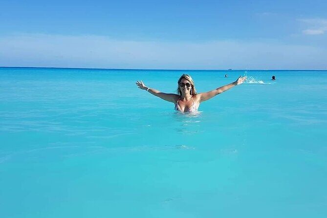 Isla Mujeres Catamaran Open Bar & Transportation from Cancun - Key Points