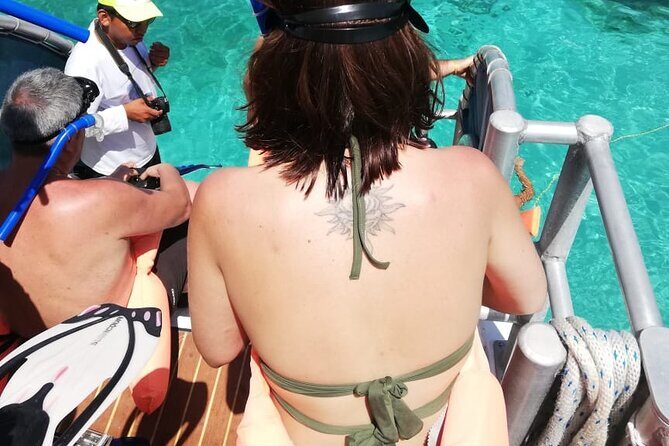 Isla Mujeres Catamaran Platinum Tour with Open Bar - Authentic Experiences and Guide Expertise