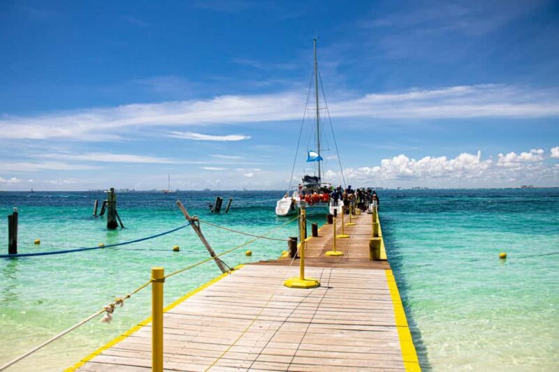 Isla Mujeres: Catamaran Ride with Open Bar, Snorkeling, and Lunch - Deep Dive into the Itinerary