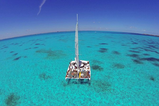 Isla Mujeres Catamaran Tour With Snorkeling at Musa, Buffet Lunch & Open Bar - Itinerary Highlights