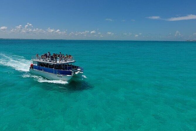 Isla Mujeres party on board! Catamaran,Lagoon,Snorkel & Downtown - The Sum Up