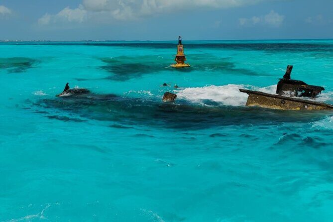Isla Mujeres Tour with buffet, open bar and snorkeling Sunken Boat - An Overview of the Tour Experience