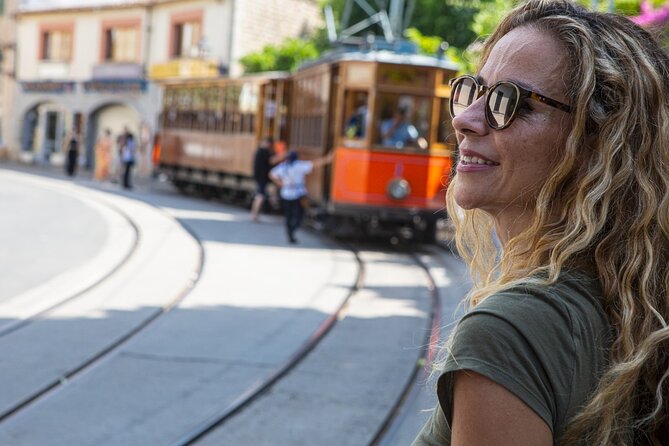 Island Tour With Train Tram Boat and Bus From Cala Millor - Meeting and Pickup Information