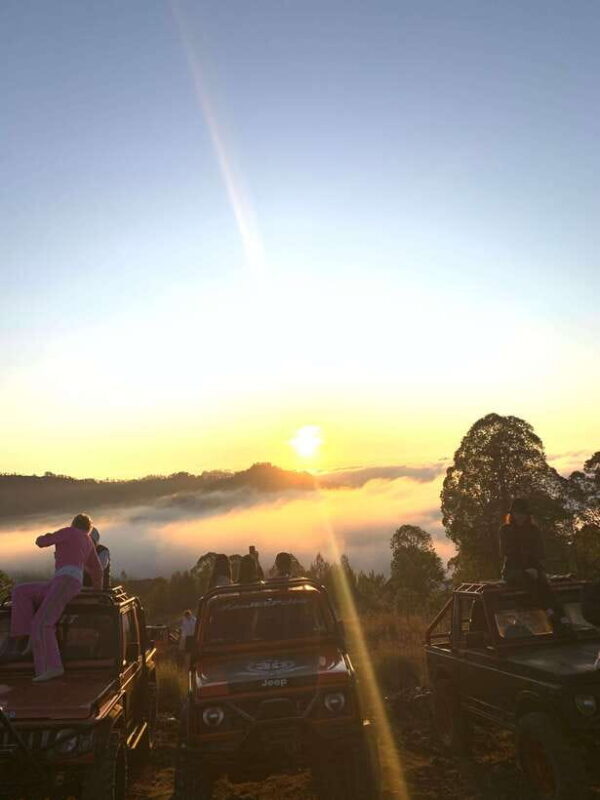 Jeep 4wd with sunrise & black lava - The Sum Up