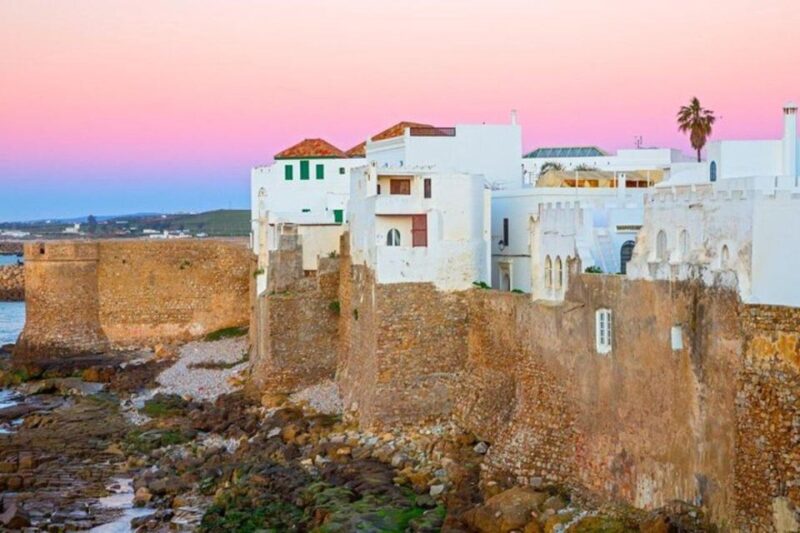 Journey Through Time: Full-Day Escape to Tangier and Assilah - Exploring Place Petit Socco