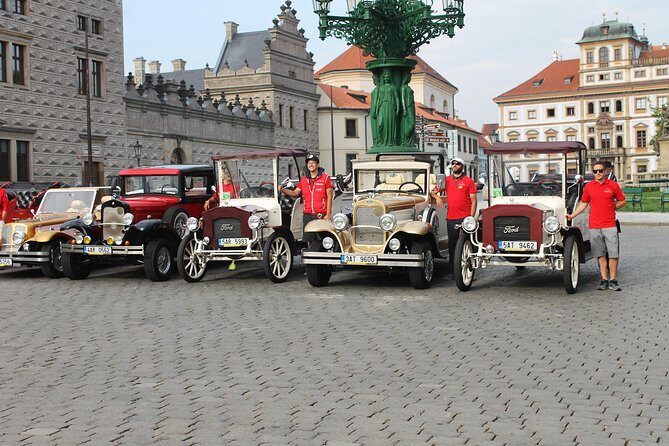 Karlstejn Castle in Vintage Convertible Car - Key Points