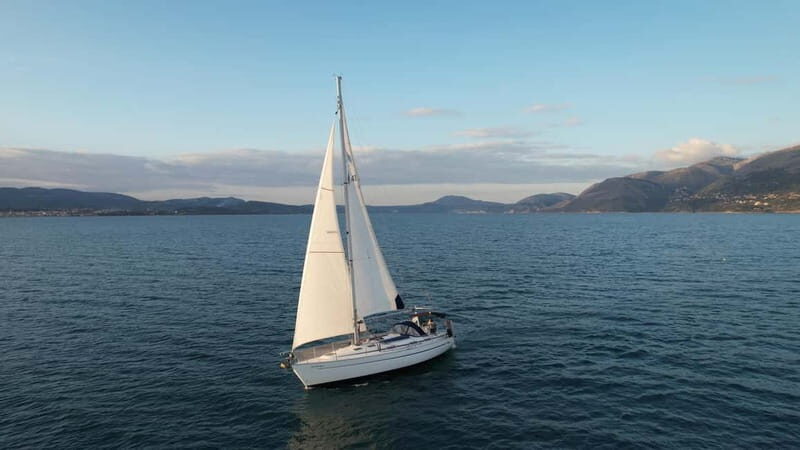 Kefalonia: Day cruise Ithaca, sailing Lunch 3 swimming spots - Key Points  