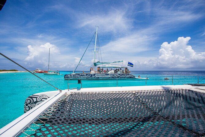 Klein Curacao Sunset Cruise with Open Bar and BBQ - Key Points