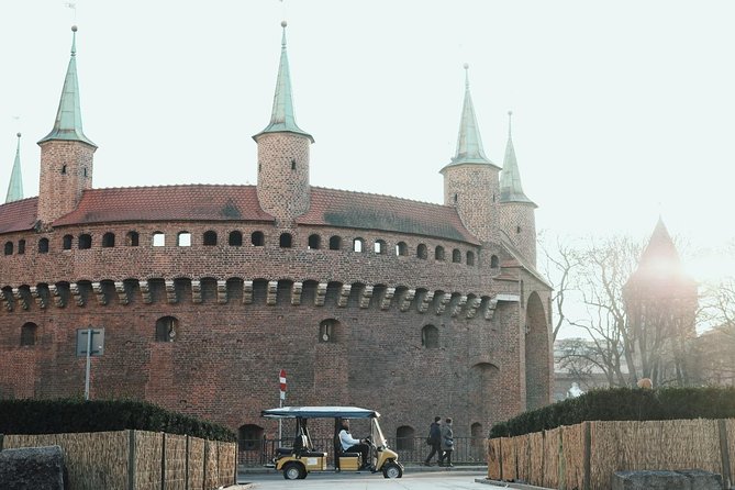 Krakow City Tour by Electric Car With Optional Old Synagogue or Town Hall Ticket - Overview of the Electric Vehicle Tour Experience