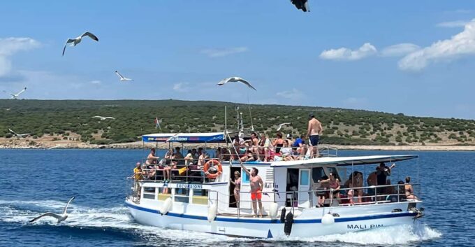 Krk: Golden Beach and Blue Cave 4 Islands With Welcome Drink - Frequently Asked Questions