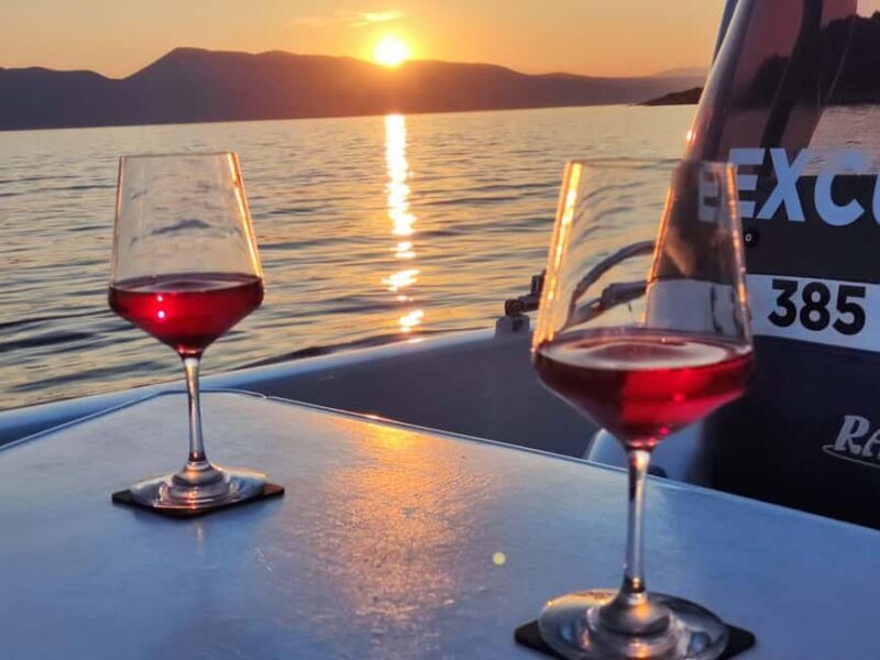 Krk: Sunset Boat Tour with wine, high chance of dolphins - Key Points