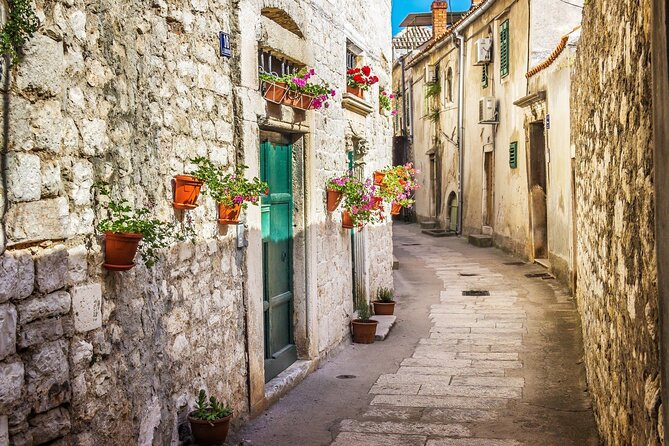 Krka Waterfalls and Wine Tasting Tour From Split or Trogir - Natural Pathways and Scenic Flora