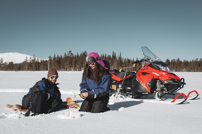 Lappish Lunch Break -Snowmobiling, Ice Fishing and Tasty Food - Ice Fishing Excursion
