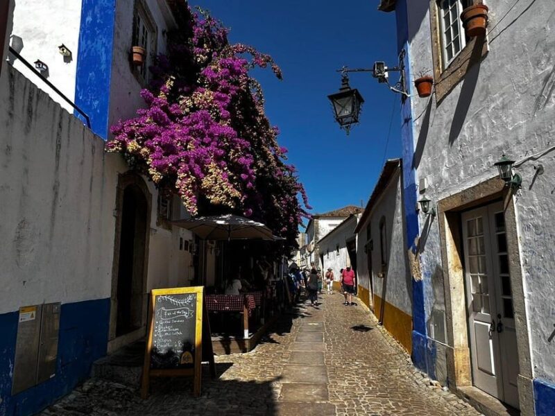 Lisbon and Obidos private day trip from Porto - Stop 2: Arriving in Lisbon - Iconic Sights and Views